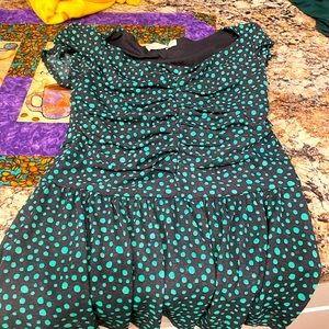 Peplum top. Green. Small.